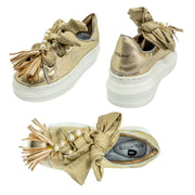 PIEL ORO ORILLA PLATA MASCADA